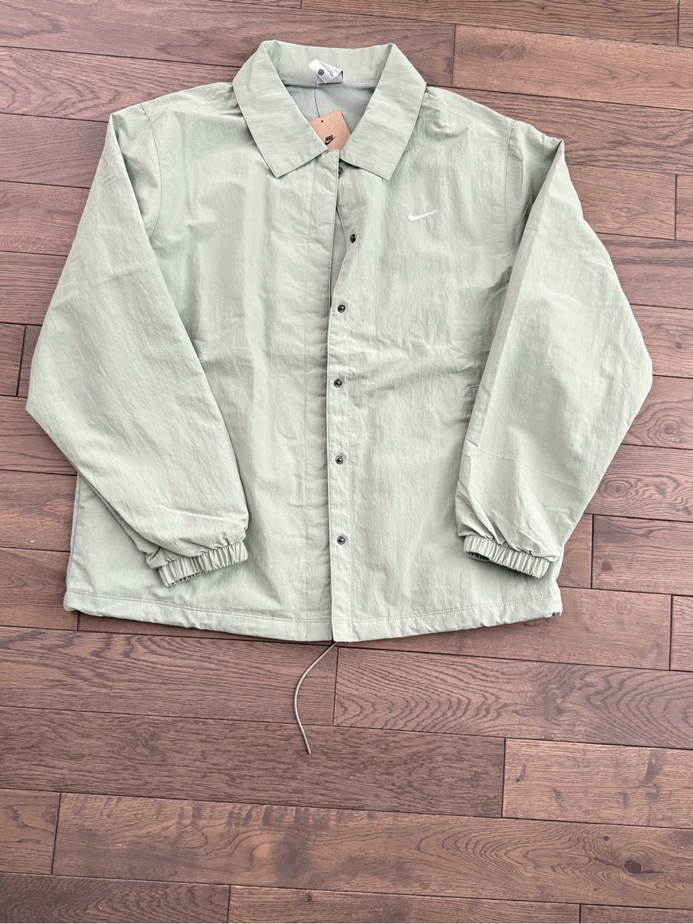 Nike Woman Light Green Windbreaker Jacket